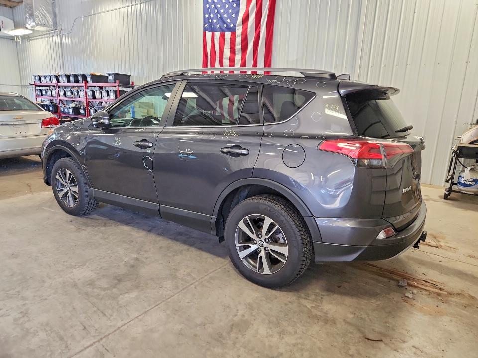 Photo 2 from auction – 2018 TOYOTA RAV4 with VIN 2T3RFREV9JW845604