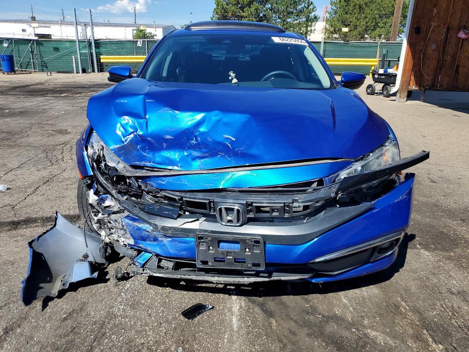 Photo 5 from auction – 2021 HONDA CIVIC with VIN 19XFC1F34ME009161