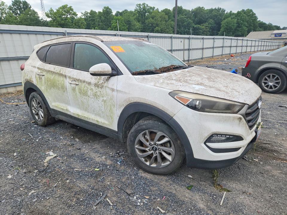 Photo 4 from auction – 2016 HYUNDAI TUCSON with VIN KM8J3CA41GU166914