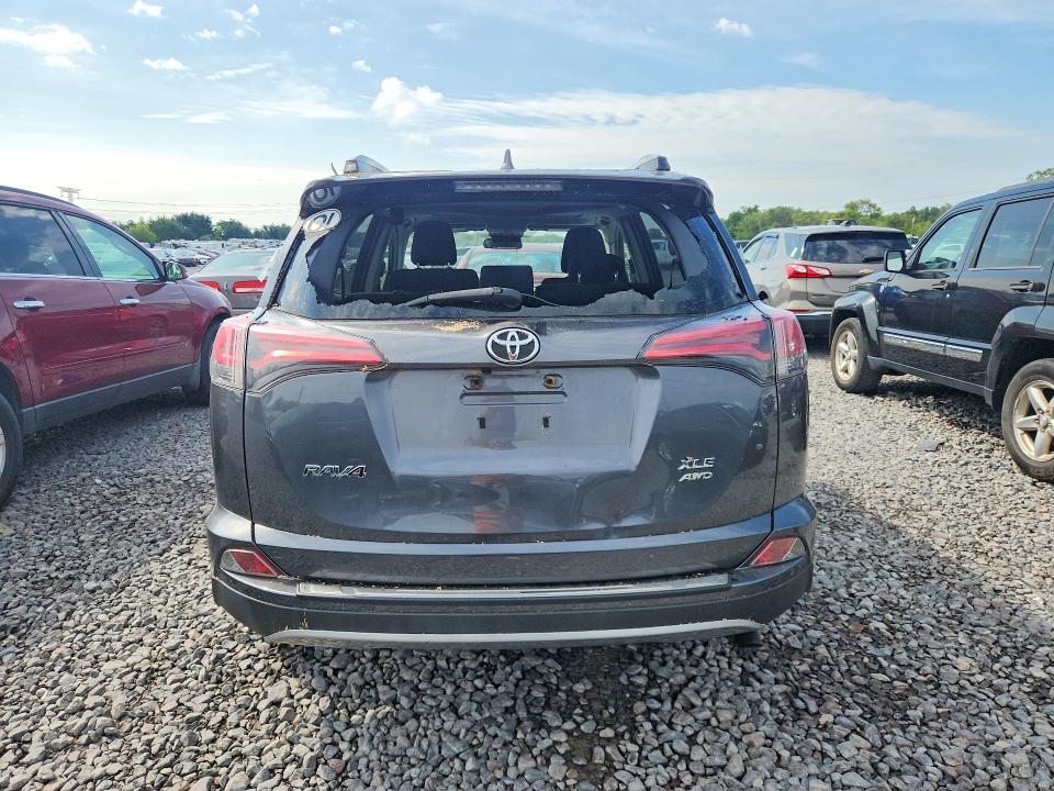 Photo 6 from auction – 2018 TOYOTA RAV4 with VIN JTMRFREV8JD222309