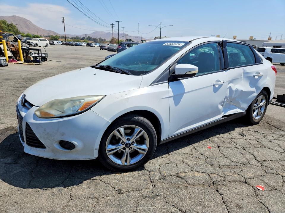 FORD FOCUS 2014 with VIN 1FADP3F23EL299230 - Photo from auction