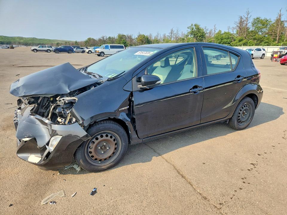 TOYOTA PRIUS C 2015 with VIN JTDKDTB37F1114537 - Photo from auction