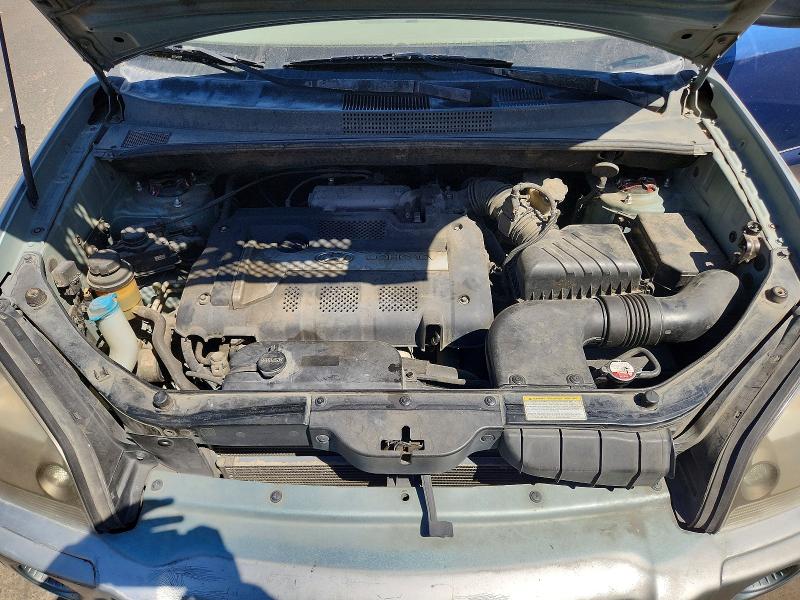 Photo 12 from auction – 2005 HYUNDAI TUCSON with VIN KM8JM12B65U079960