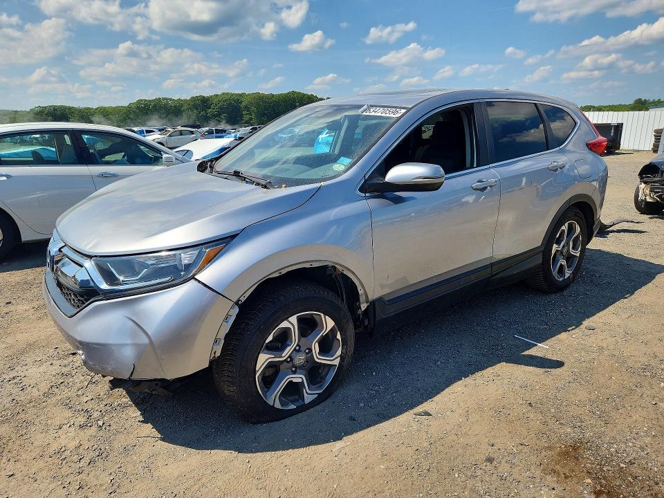 Photo 1 from auction – 2018 HONDA CR-V with VIN 7FARW2H57JE009321