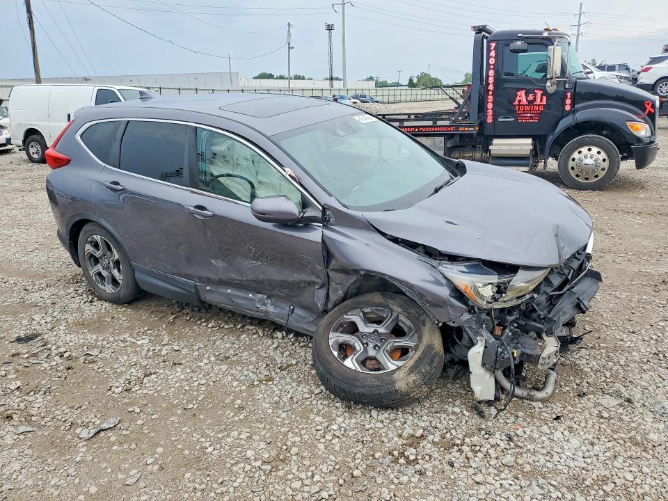 Photo 4 from auction – 2017 HONDA CR-V with VIN 2HKRW2H50HH608228
