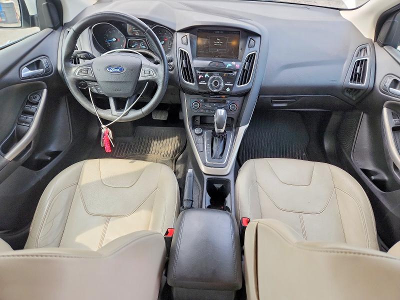 Photo 8 from auction – 2015 FORD FOCUS with VIN 1FADP3N23FL228547