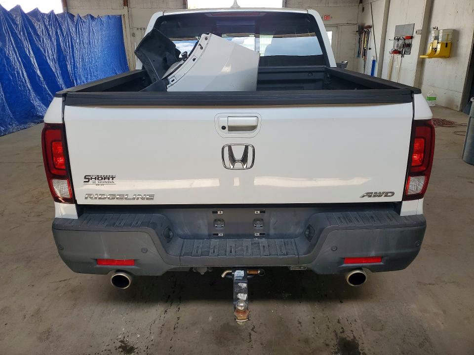 Photo 6 from auction – 2023 HONDA RIDGELINE with VIN 5FPYK3F73PB016960
