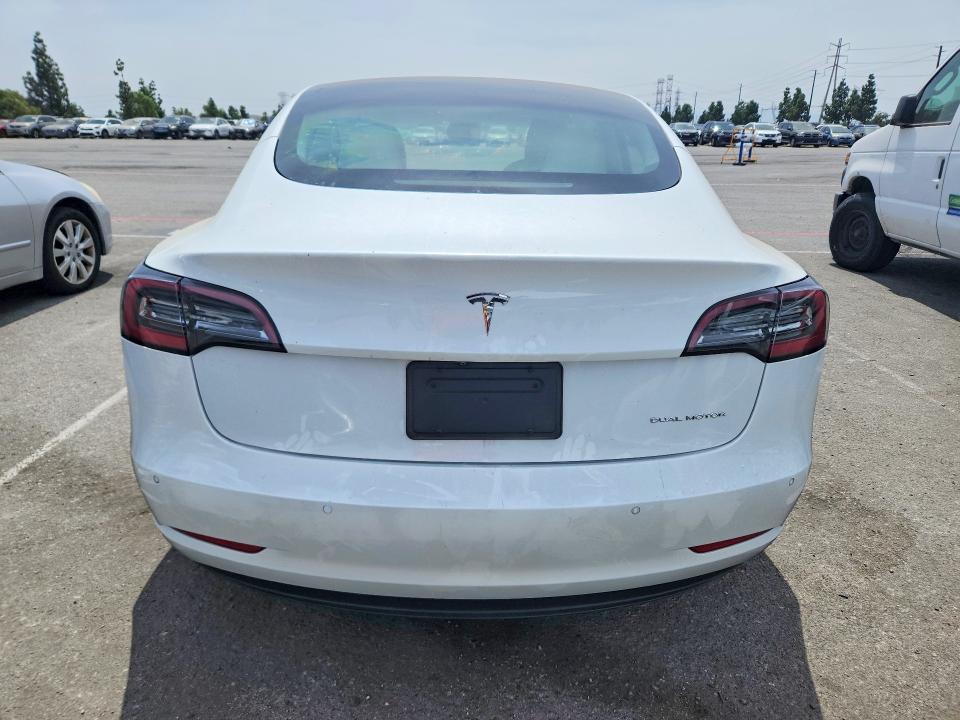 Photo 6 from auction – 2021 TESLA MODEL 3 with VIN 5YJ3E1EB0MF000554