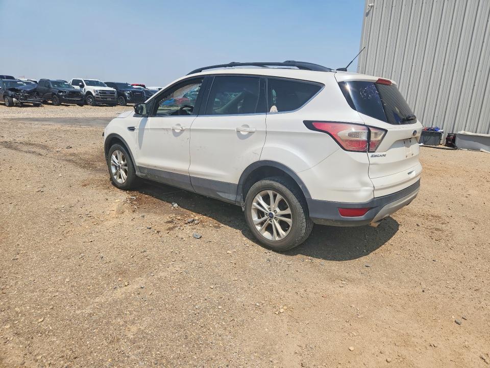 Photo 2 from auction – 2018 FORD ESCAPE with VIN 1FMCU9GD8JUD12362