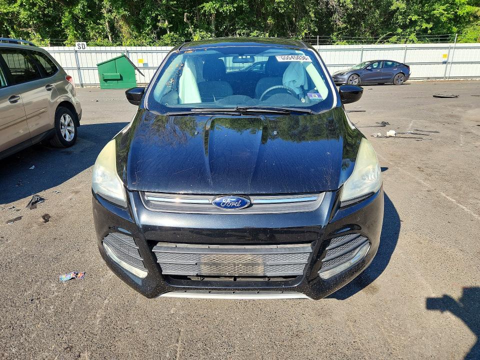 Photo 5 from auction – 2015 FORD ESCAPE with VIN 1FMCU9GX6FUC33709
