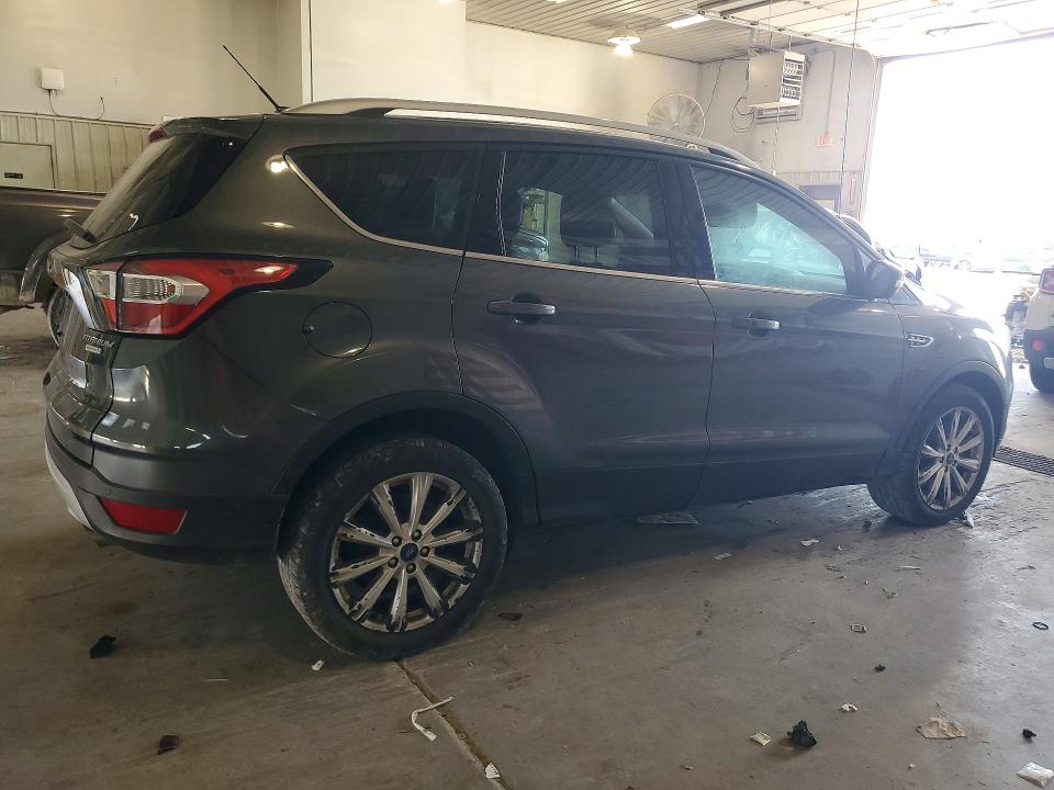 Photo 3 from auction – 2017 FORD ESCAPE with VIN 1FMCU0J94HUD95010