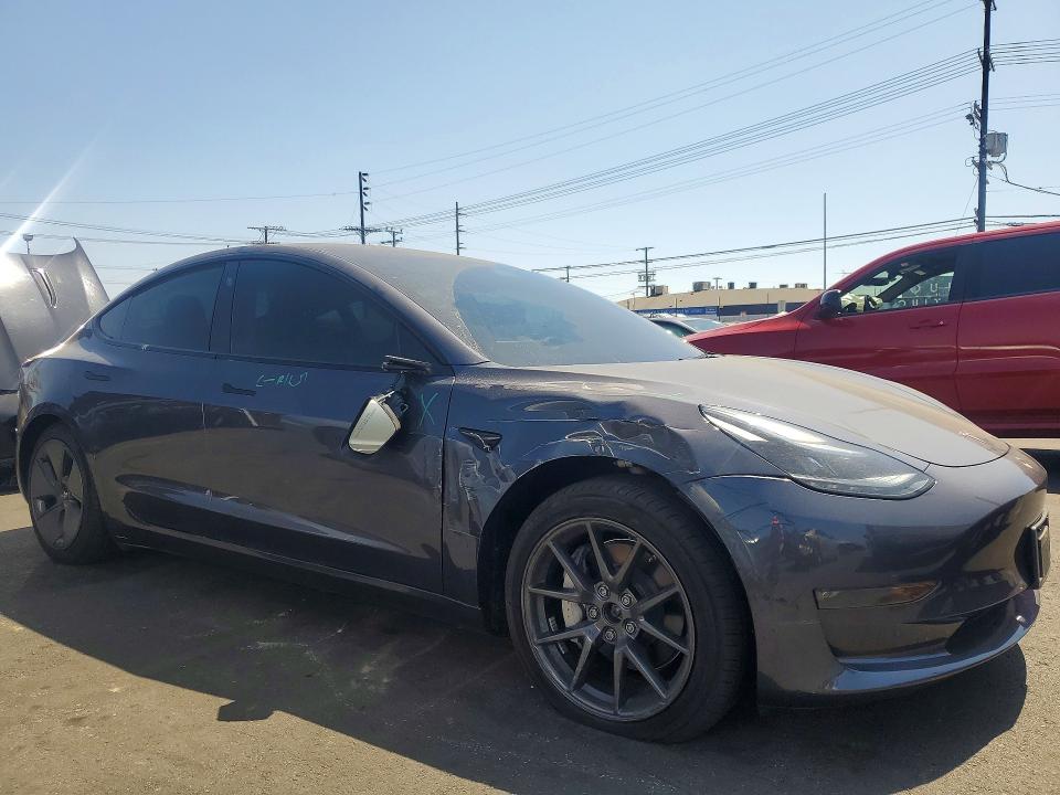 Photo 4 from auction – 2023 TESLA MODEL 3 with VIN 5YJ3E1EB6PF712300