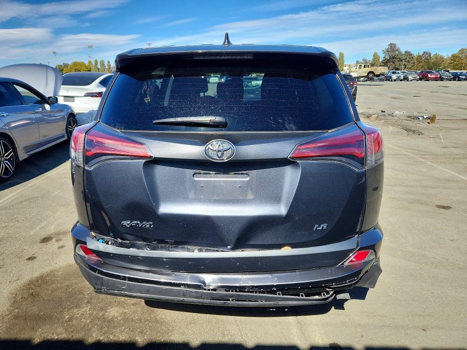 Photo 6 from auction – 2018 TOYOTA RAV4 with VIN 2T3ZFREV9JW494256