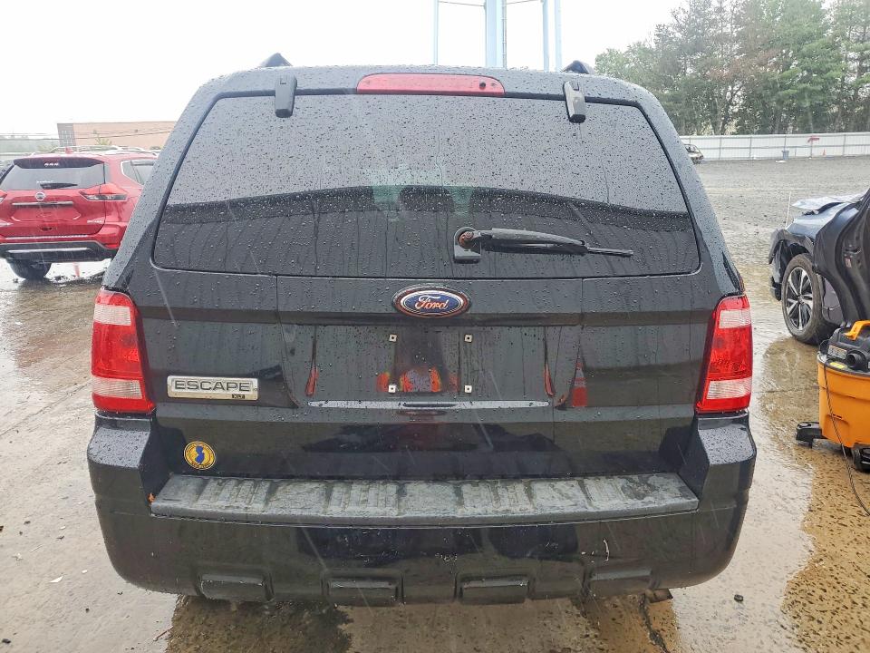 Photo 6 from auction – 2009 FORD ESCAPE with VIN 1FMCU03729KD03921