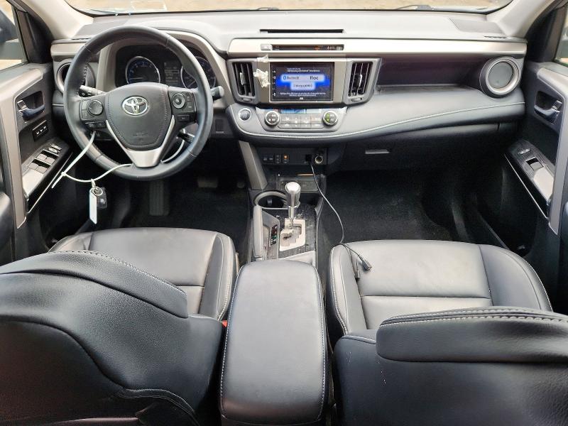 Photo 8 from auction – 2018 TOYOTA RAV4 with VIN 2T3DFREV7JW855669