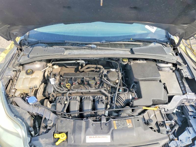 Photo 11 from auction – 2014 FORD FOCUS with VIN 1FADP3F20EL275791