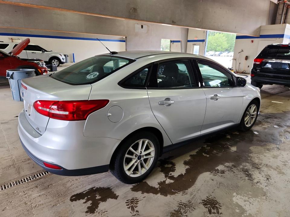Photo 3 from auction – 2016 FORD FOCUS with VIN 1FADP3F27GL402832