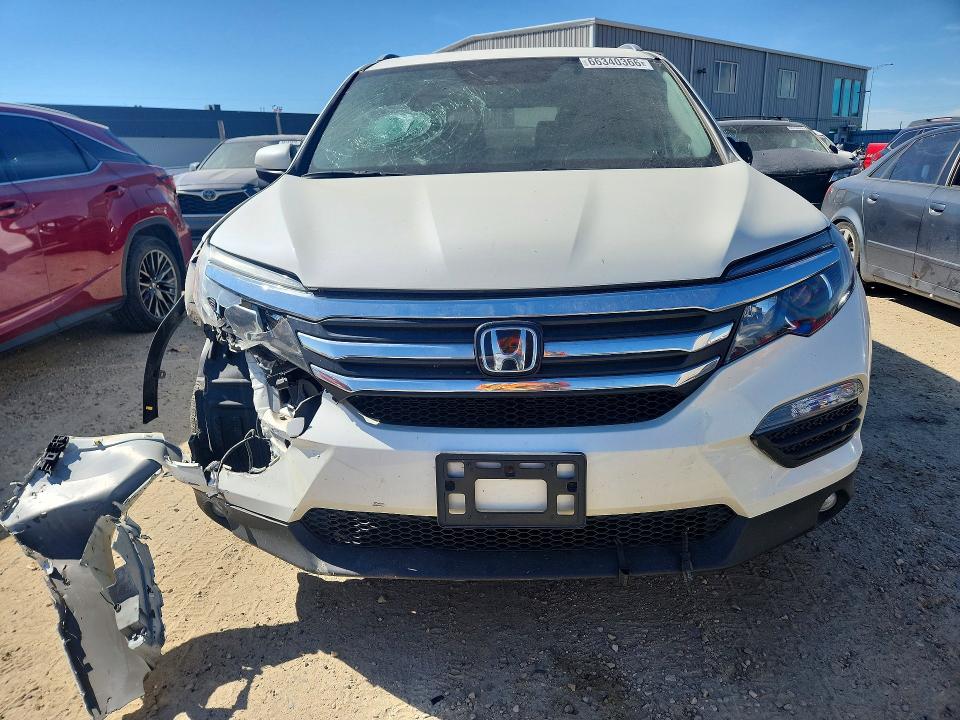 Photo 5 from auction – 2018 HONDA PILOT with VIN 5FNYF6H77JB500889