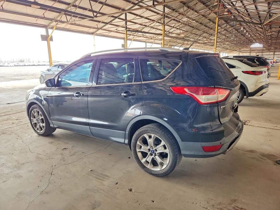 Photo 2 from auction – 2014 FORD ESCAPE with VIN 1FMCU0J97EUC85421