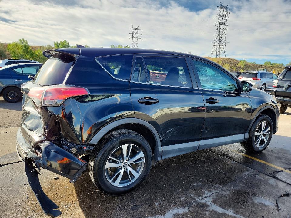 Photo 3 from auction – 2018 TOYOTA RAV4 with VIN 2T3RFREV8JW792278