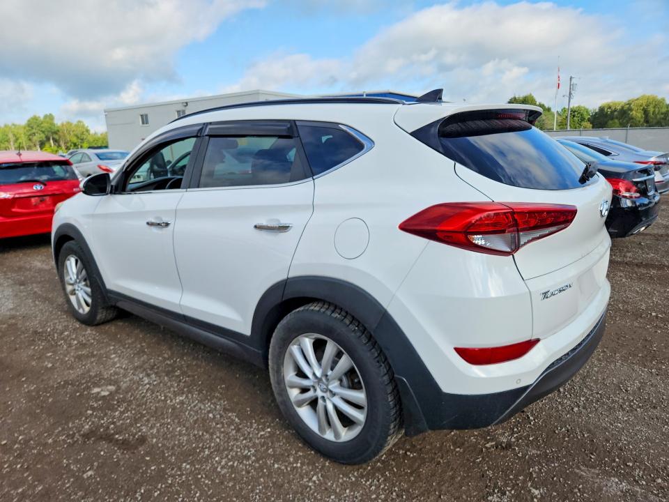 Photo 2 from auction – 2016 HYUNDAI TUCSON with VIN KM8J3CA21GU036761