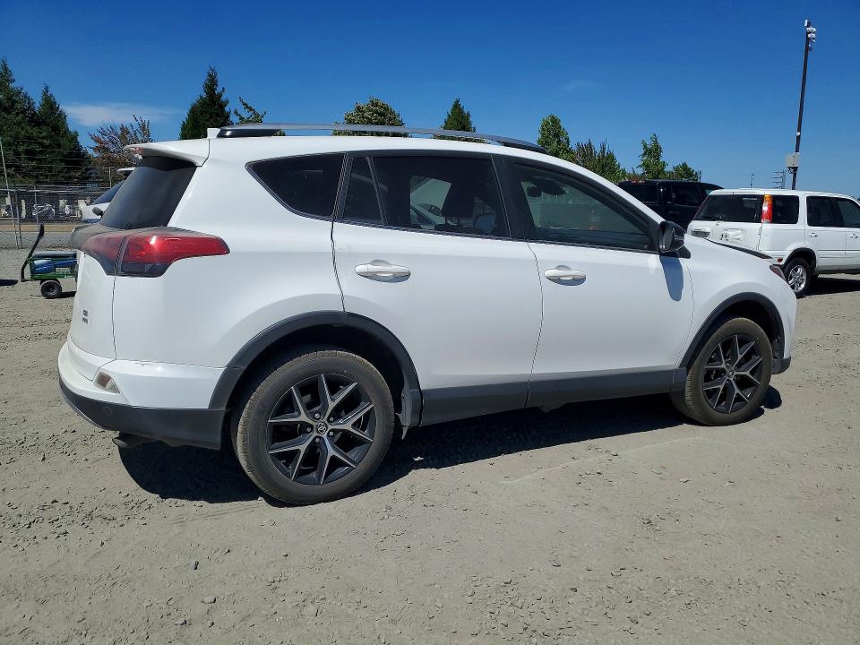 Photo 3 from auction – 2018 TOYOTA RAV4 with VIN JTMJFREV9JD234417