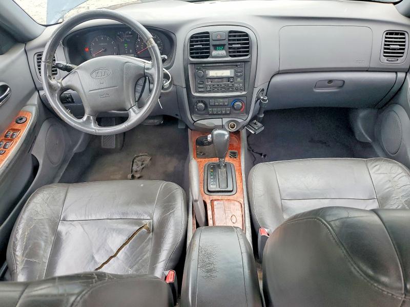 Photo 8 from auction – 2002 KIA OPTIMA with VIN KNAGD126025169075