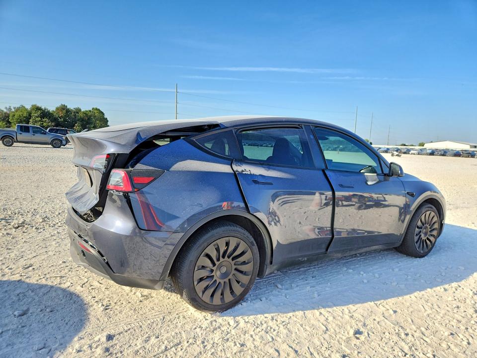 Снимка 3 от търг – 2023 TESLA MODEL Y с VIN 7SAYGDEE2PA198988