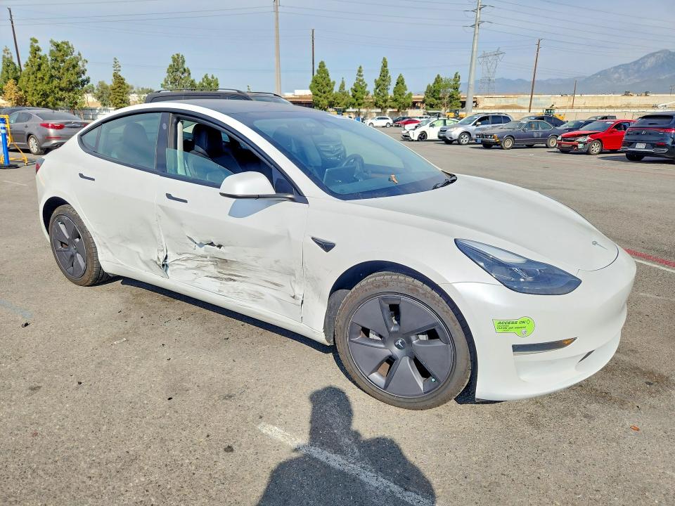 Photo 4 from auction – 2023 TESLA MODEL 3 with VIN 5YJ3E1EA1PF501206
