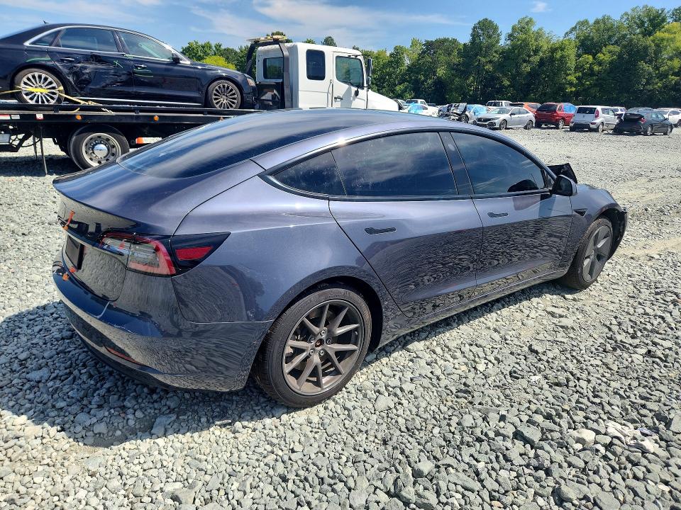 Photo 3 from auction – 2021 TESLA MODEL 3 with VIN 5YJ3E1EA1MF099800