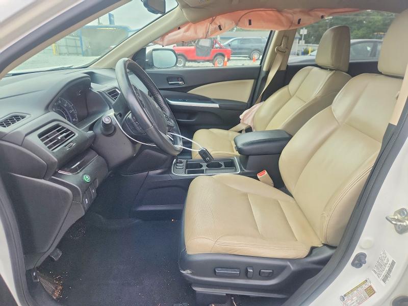 Photo 7 from auction – 2015 HONDA CR-V with VIN 5J6RM4H70FL021582