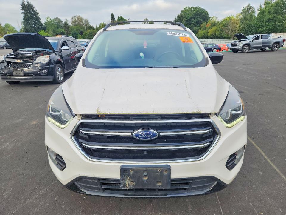 Photo 5 from auction – 2018 FORD ESCAPE with VIN 1FMCU9GD9JUC10021