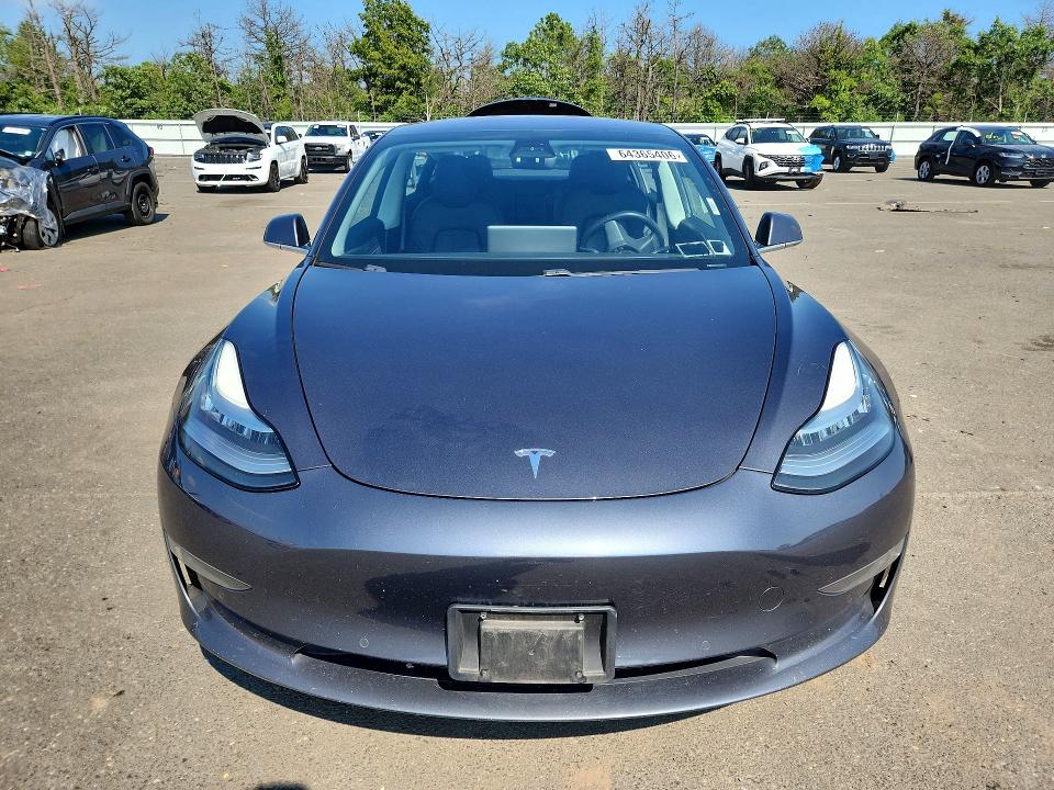 Photo 5 from auction – 2018 TESLA MODEL 3 with VIN 5YJ3E1EA3JF031087