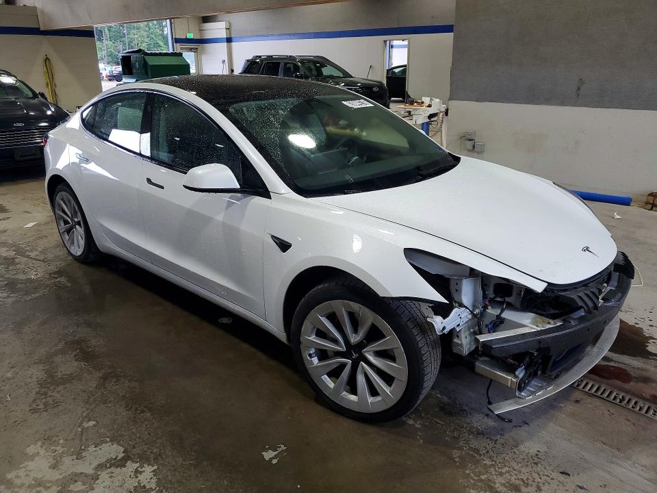 Photo 4 from auction – 2022 TESLA MODEL 3 with VIN 5YJ3E1EA2NF369568