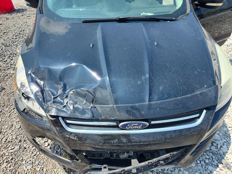 Photo 12 from auction – 2016 FORD ESCAPE with VIN 1FMCU9J98GUC53326