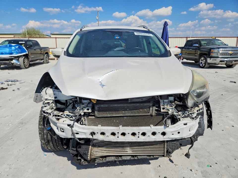 Photo 5 from auction – 2017 FORD ESCAPE with VIN 1FMCU0J95HUE15670