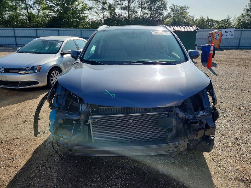 Photo 5 from auction – 2015 HONDA CR-V with VIN 2HKRM4H71FH668079