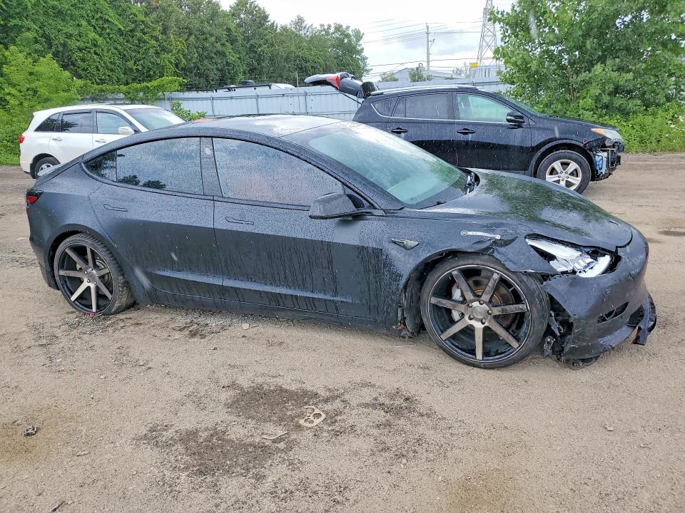 Photo 4 from auction – 2018 TESLA MODEL 3 with VIN 5YJ3E1EA4JF028389