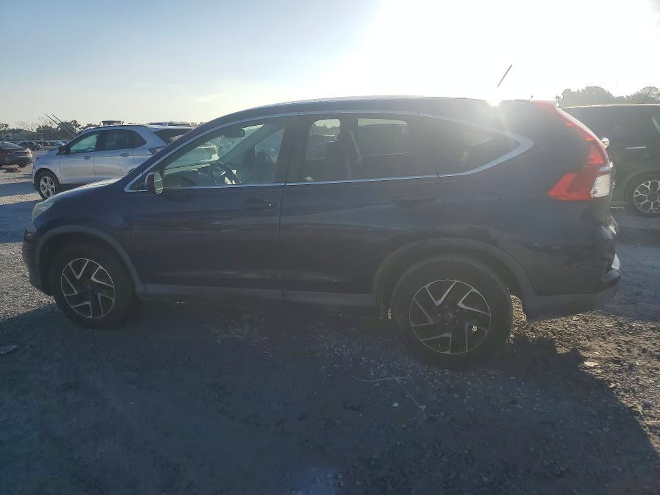 Photo 2 from auction – 2016 HONDA CR-V with VIN 2HKRM3H49GH506394