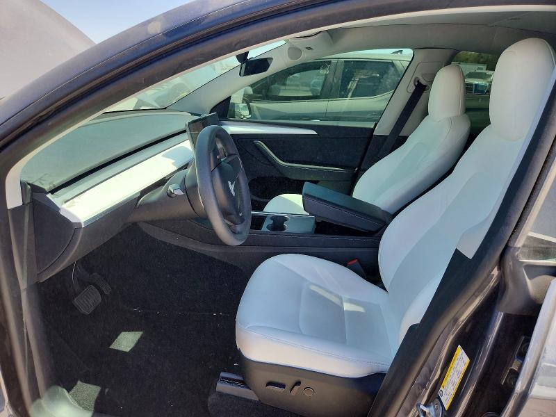 Photo 7 from auction – 2023 TESLA MODEL Y with VIN 7SAYGDEE1PF853435