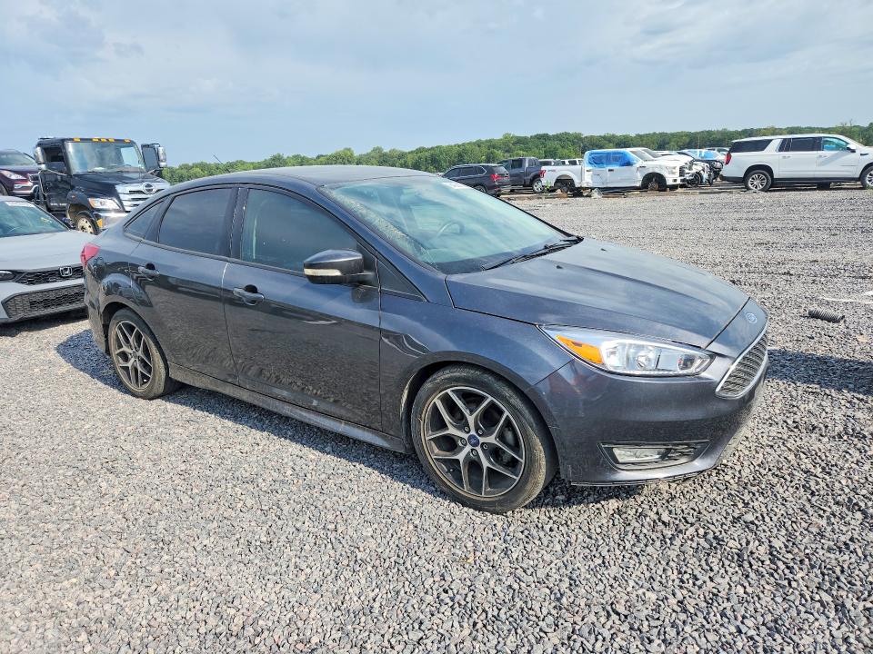 Photo 4 from auction – 2016 FORD FOCUS with VIN 1FADP3F25GL379549