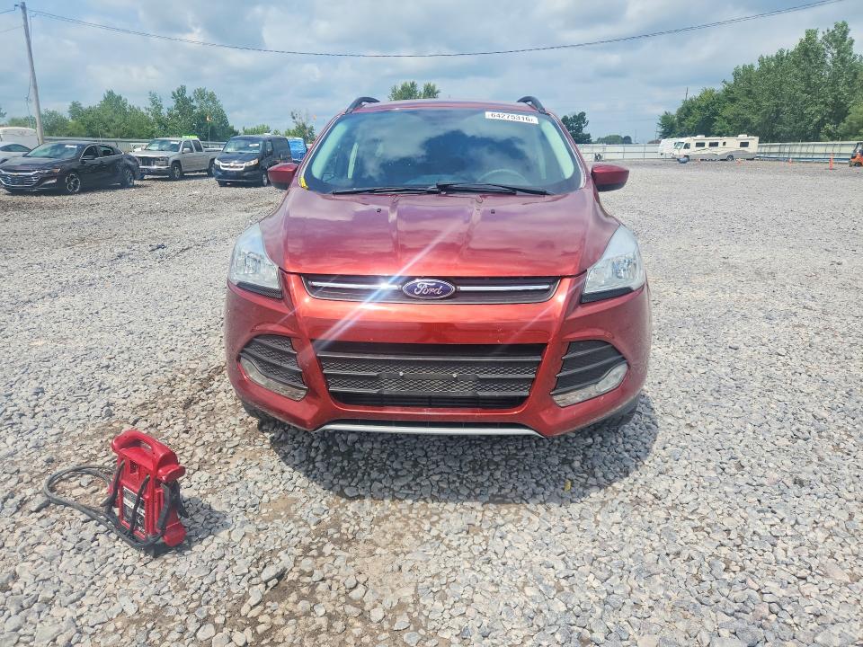 Photo 5 from auction – 2016 FORD ESCAPE with VIN 1FMCU9G95GUC36913