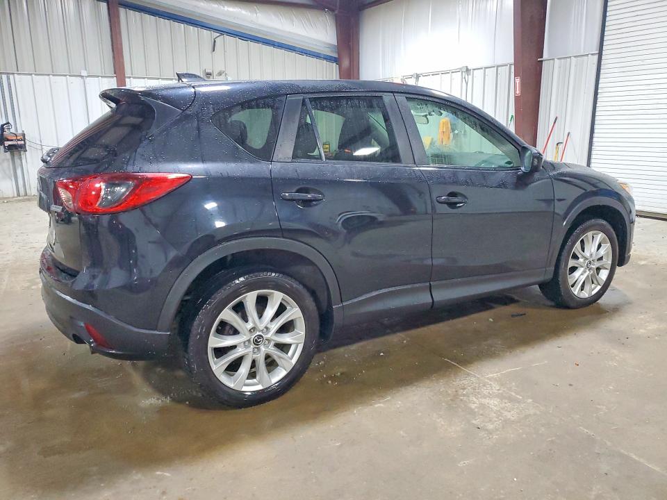 Photo 3 from auction – 2014 MAZDA CX-5 with VIN JM3KE4DY3E0305878