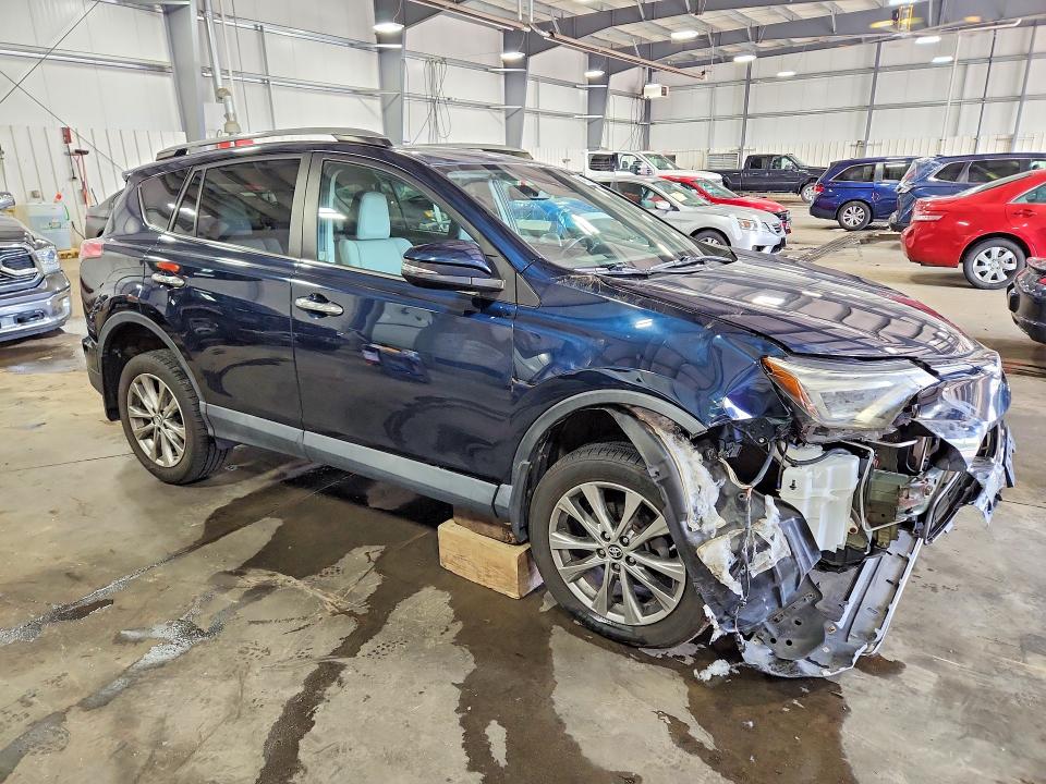 Photo 4 from auction – 2017 TOYOTA RAV4 with VIN 2T3DFREV7HW687851