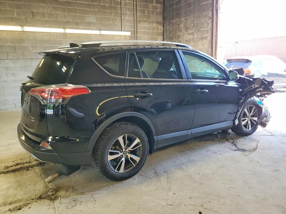 Photo 3 from auction – 2018 TOYOTA RAV4 with VIN 2T3RFREV9JW720750