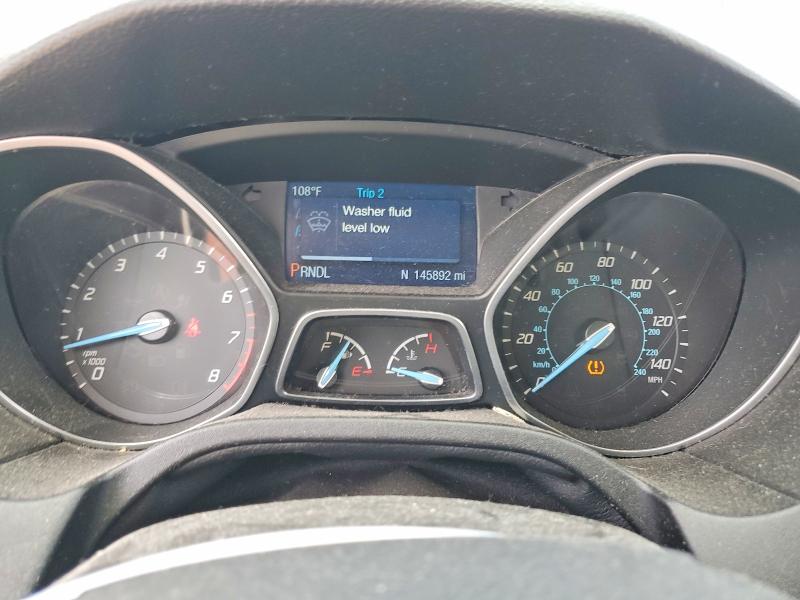 Снимка 9 от търг – 2014 FORD FOCUS с VIN 1FADP3E27EL287342
