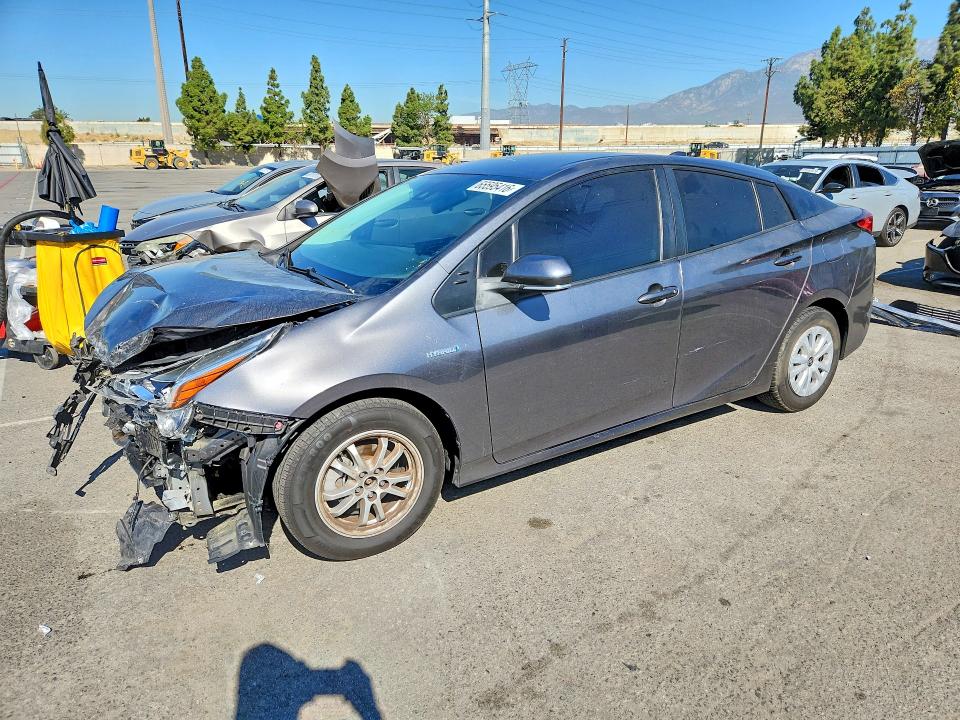 TOYOTA PRIUS 2021 with VIN JTDKAMFU4M3135817 - Photo from auction