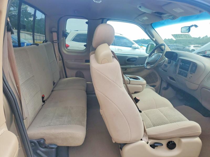 Photo 10 from auction – 2003 FORD F150 with VIN 1FTRX18L03NB76660