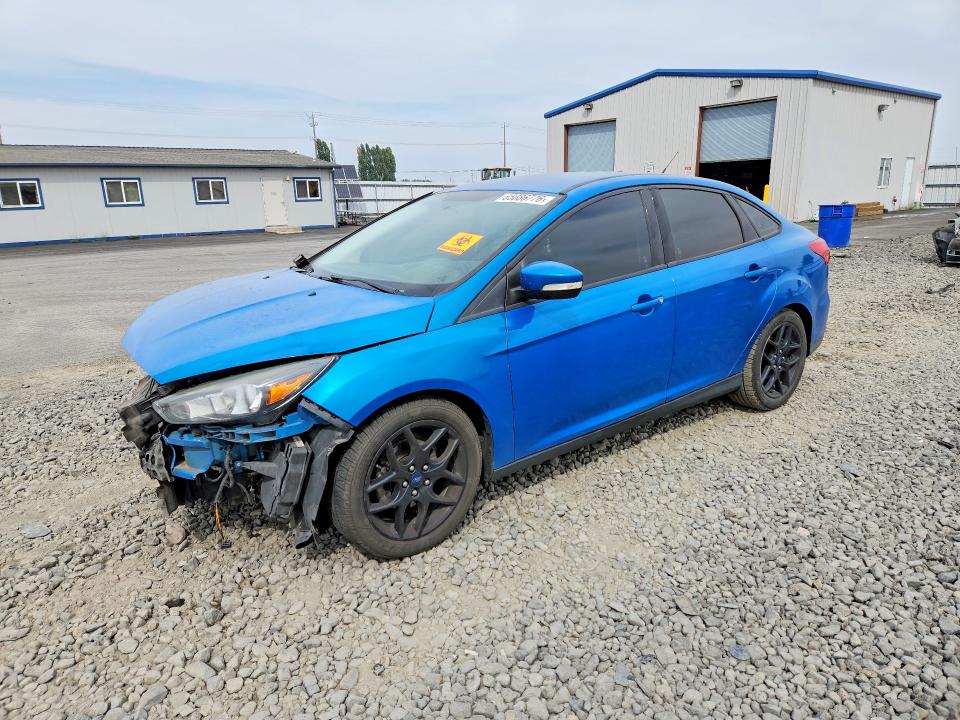 FORD FOCUS 2016 with VIN 1FADP3F2XGL282833 - Photo from auction