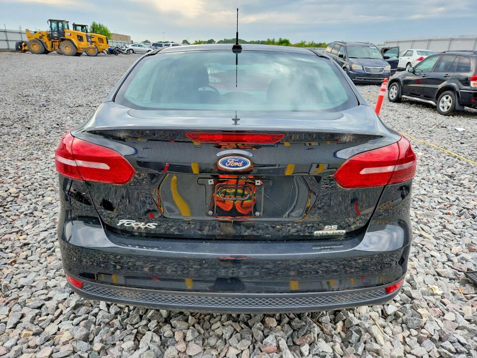 Photo 6 from auction – 2016 FORD FOCUS with VIN 1FADP3F22GL220634